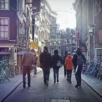 A small group on a tour in the heart of Amsterdam